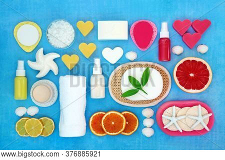 Skin care beauty treatment with citrus fruit, ex foliation, moisturiser & spa cleansing products for a youthful skin. Natural health concept. Flat lay. Top view.