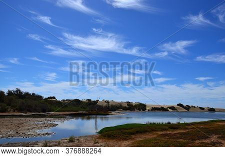 Charca De Maspalomas, Dunes And Blue Sky With Some Clouds, Gran Canaria, Canary Islands, Spain