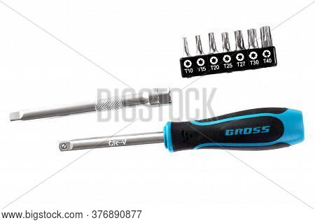 Novyy Urengoy, Russia - July 11, 2020: Screwdriver With An Extension Bar And Torx Bits Gross Isolate