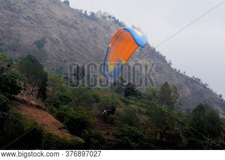 Naukuchia Taal, Nanital, Uttarakhand, India, 31 May, 2018:   A Glider Glidding In The Mountains Of H
