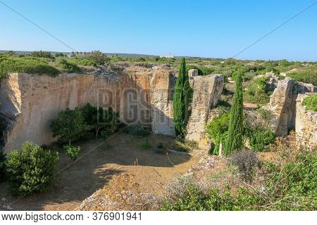 Lithica Stone Quarry On Balearic Islands. Spain. Old Stone-pit On Menorca. Ancient Quarry On The Isl