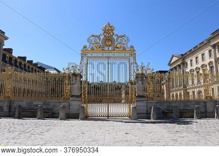 The Gates Of The Cour D'honneur Of The Palace Of Versailles