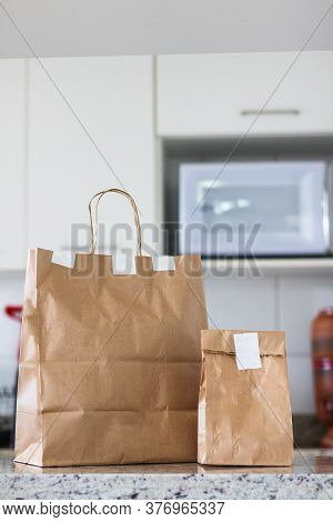 Delivery Home Food App Concept Image With Paper Bag. Space For Text Or Logo.