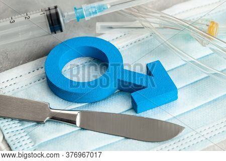 Sex-change Operation. Change Of Male To Female. Symbol Of A Man And A Scalpel With A Syringe. Surgic