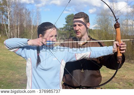 Russia, St. Petersburg 24,05,2017 A Girl Shoots From A Bow At The Festival Of Medieval Culture 