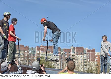 Russia, St. Petersburg, 10,05,2015.boy On Scooter Flips In The Air, The Youth Festival Of Extreme Sp
