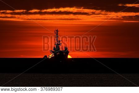 Fireboat And Sun - Sunrise Over The Seaport