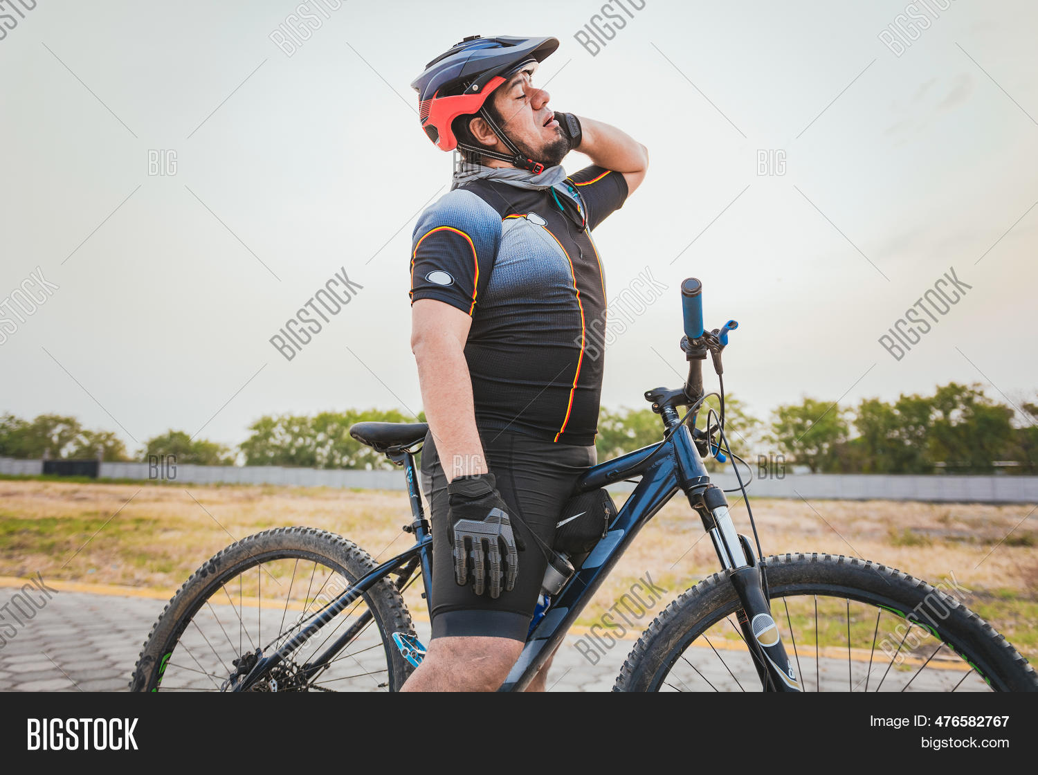 Male Cyclist Neck Pain Image & Photo (Free Trial) Bigstock