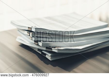 Closeup Office Table With Organized Stacked Papers, As The Concept Of Organized Document Management 