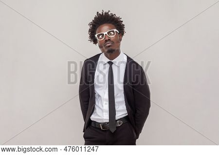 Portrait Of Funny Comic Man In Glasses Crosses Eyes, Pouts Lips, Makes Grimace, Foolishes After All 