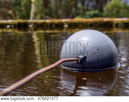Close-up Photography Of An Old Water Tank Float Valve With A Rusty Rod Atached To A Leaking Plastic 