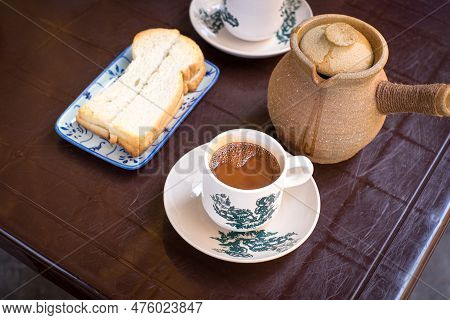 Breakfast With Claypot Coffee And Toast Bread. Top View.