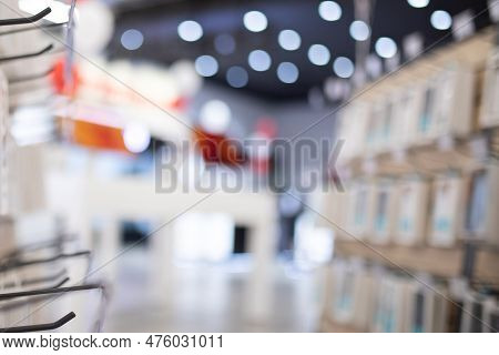 Blurred Background From Small Electronics Store And Cellular Accessories