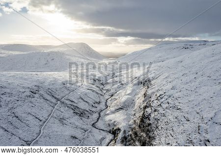 The Snow Covered Glenveagh Mountains And Glen In County Donegal - Republic Of Ireland