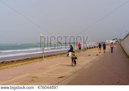 El Jadida, Morocco - April 08, 2023: Scene Of The Beach Promenade, With Locals And Visitors, In El J