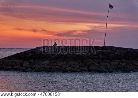 Pantai Jerman (german Beach) In Kuta, Bali Indonesia Sunset Shot Showing  People Enjoying The Beach