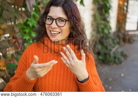 Happy Curly Woman Blogger Smiling Face Talking To Webcam Recording Vlog. Social Media Influencer Wom