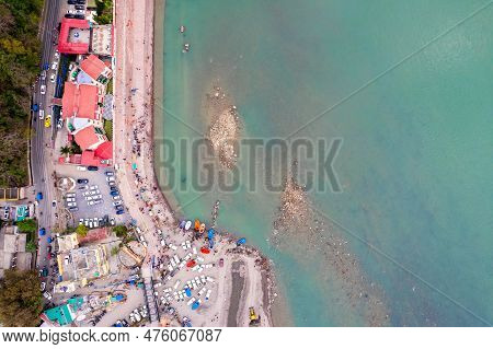 Aerial Drone Shot Showing Rafts For Water Adventure Sports On The Blue Waters Of Ganga River In Rish
