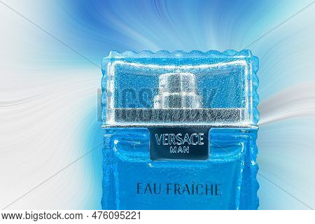 Poland, Warsaw - May 10, 2023: Perfume, Versace For Men. A Bottle Of Versace Men's Perfume On A Blue