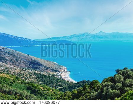 Adriatic Sea Summer Coast With Beach And Corfu Island In Mist, Lukove Komuna, Albania. View From Mou