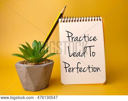 Green Plant And Notebook With The Word Practice Lead To Perfection On A Yellow Background