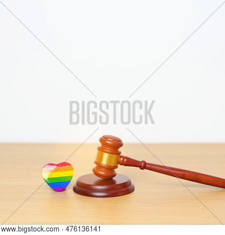 Lgbt Law And Pride Month Concepts. Gavel Justice Hammer With Rainbow Colorful Heart Shape For Lesbia