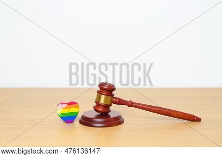 Lgbt Law And Pride Month Concepts. Gavel Justice Hammer With Rainbow Colorful Heart Shape For Lesbia