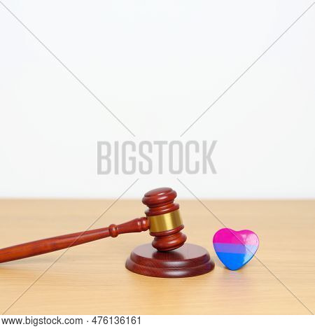 Bisexuality, Lgbtq Law And Pride Month Concepts. Gavel Justice Hammer With Purple, Pink And Blue Hea