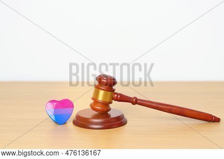 Bisexuality, Lgbtq Law And Pride Month Concepts. Gavel Justice Hammer With Purple, Pink And Blue Hea