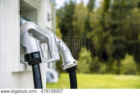 Charging Station For Electric Cars. Types And Connectors Of Ports For Charging Vehicles.