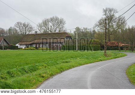 Bending Road Through The Agriculture Fields And Farms, Geel, Flanders, Belgium