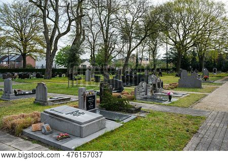 Geel, Antwerp Province, Belgium - April 22, 2023 - Graveyard And Tombs Of The Village