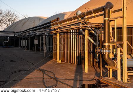 Meerhout, Antwerp Province, Belgium - April 25, 2023 - Pipes Of An Industrial Biogas Powerplant