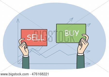 Businessman Hands On Stock Market Chart Background Hold Buy And Sell Signs. Man Trader Or Investor E