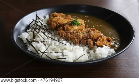 Chicken Katsu Curry Is A Meal Crispy Chicken Chunks Served Over Rice With Japanese Curry Sauce.