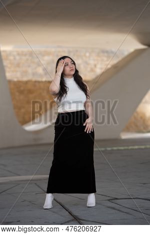Young Attractive Woman Wearing Casual Clothing Posing Outdoors In The City. Nicosia Cyprus