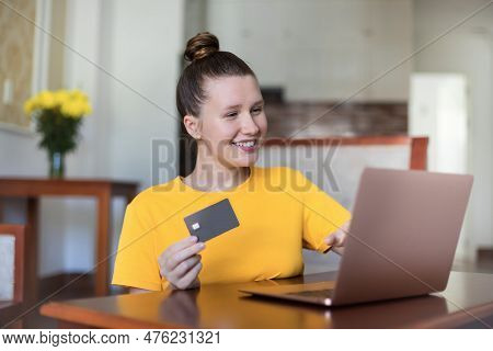 Portrait Of Happy Girl, Young Positive Pretty Woman Paying, Holding Credit Bank Card With Phone, Lap
