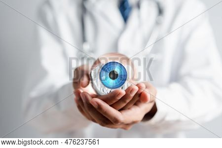 Digital Vision Eye Care Concept. Doctor Using Technology For Eye Test Vision, Checking Eyesight, Eye