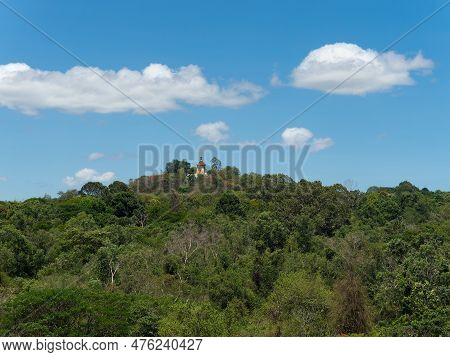 Lush Forest And Wat Mondop, A Shrine On A Hilltop And Part Of The Wat Yan Temple Complex In Huai Yai