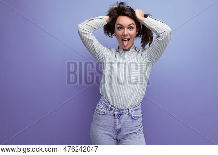 Charming Young Brunette Female Adult With Chic Silky Healthy Hair Below Her Shoulders In A Studio Ba