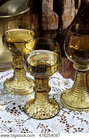 Antique German Glassware, Old Dutch Style Rummer Or Roemer Glasses With White Wine On White Lace Tab