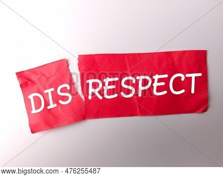 Red Paper With The Word Disrespect On White Background