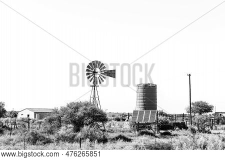 Douglas, South Africa - Mar 1, 2023: Old And New Technology At De Rust Between Douglas And Prieska. 