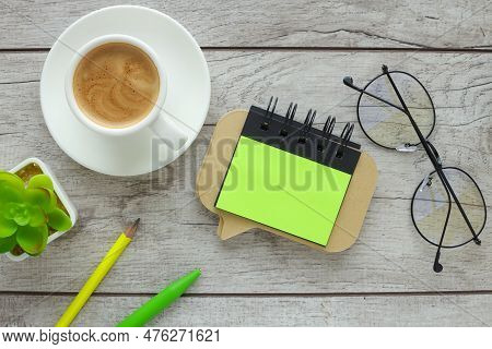 Office Atable With Blank Notebook And Laptop. Bright Sticker With Place For Text.coffee Cup
