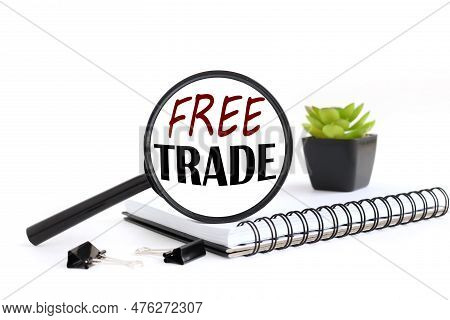 Free Trade Text Near Financial Reports And Calculator.financial And Trading Concept.