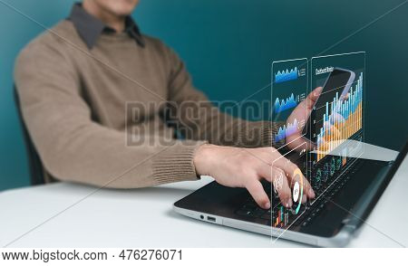 Businessman Evaluating His Industry Marketing, Financial Organization Planning, And Enterprise Data 