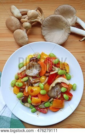 Delectable Colorful Grilled Vegetable Salad With Fresh Indian Oyster Mushrooms On Wooden Table