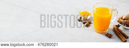 Turmeric Tea, Healthy Beverage With Turmeric Root And Spices, Jamu Juice, Immunity Booster Drink On
