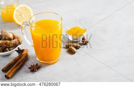 Turmeric Tea, Healthy Beverage With Turmeric Root And Spices, Jamu Juice, Immunity Booster Drink On