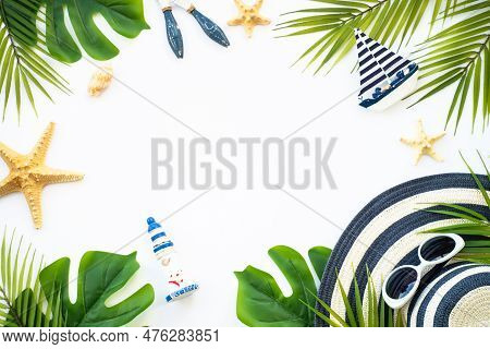 Summer Flat Lay Background. Summer Vacation And Travel Concept. Palm Leaves, Sea Shells And Decor On
